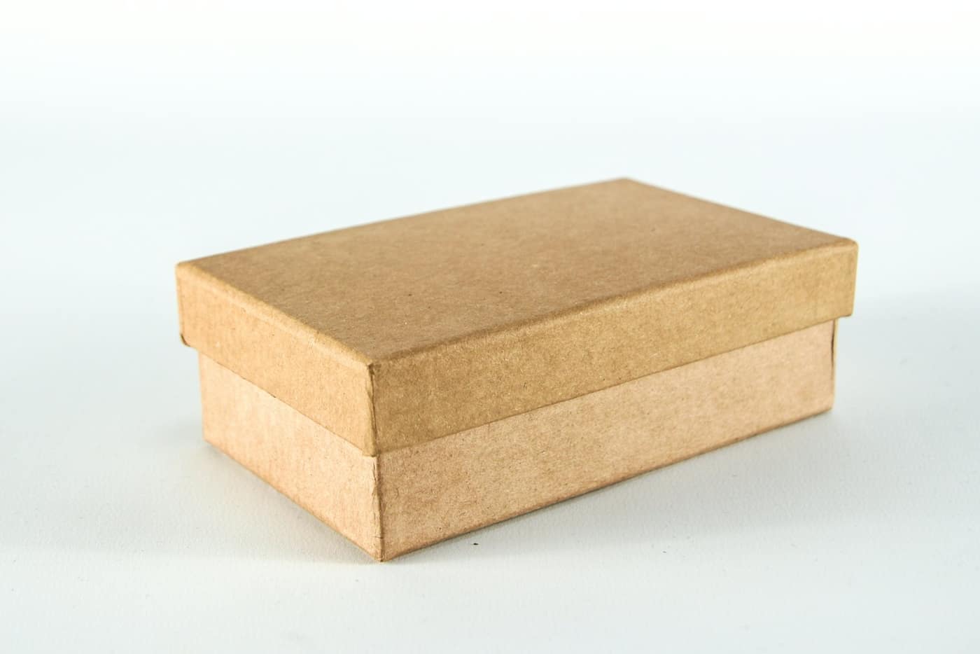 A small kraft gift box with a fitted lid